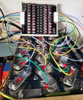 Heavy Duty Battery Active Equalizer Balancer Board For 12S 13S 14S 16S Cells With 5.5 Amps connected to battery cells.