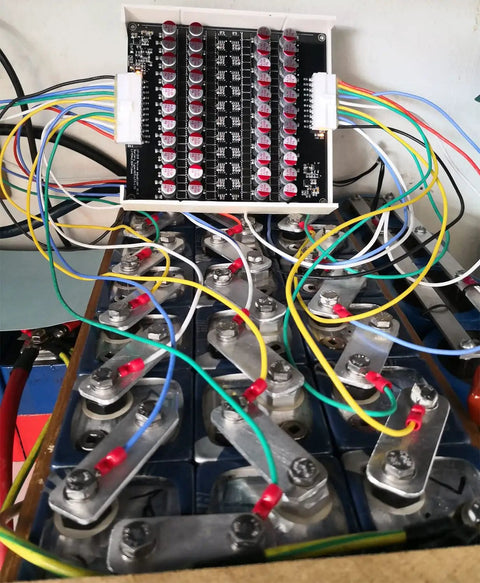 Heavy Duty Battery Active Equalizer Balancer Board For 12S 13S 14S 16S Cells With 5.5 Amps connected to battery cells.