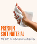 Touchless Commercial Paper Towels 10 x 800 White Roll Towels High Capacity Premium Quality With Fabric Cloth Like Texture shown in hand