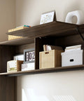 Cool L Shaped Electric Standing Desk In Dark Walnut With Smart Hutch And Built In Storage For Home Office, showcasing hutch with storage baskets and decor.