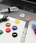 Must Have 150 Piece Cable Tie Set With 4 6 8 10 Inch Reusable Hook And Loop Wire Straps in use on cords near laptop