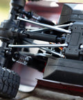 Close-up of Aluminum Linkage Set for Redcat 1/18 Ascent-18 RC Crawler - Titanium Finish Upgrade Kit, installed underside view