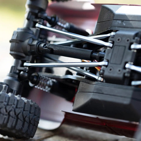 Close-up of Aluminum Linkage Set for Redcat 1/18 Ascent-18 RC Crawler - Titanium Finish Upgrade Kit, installed underside view