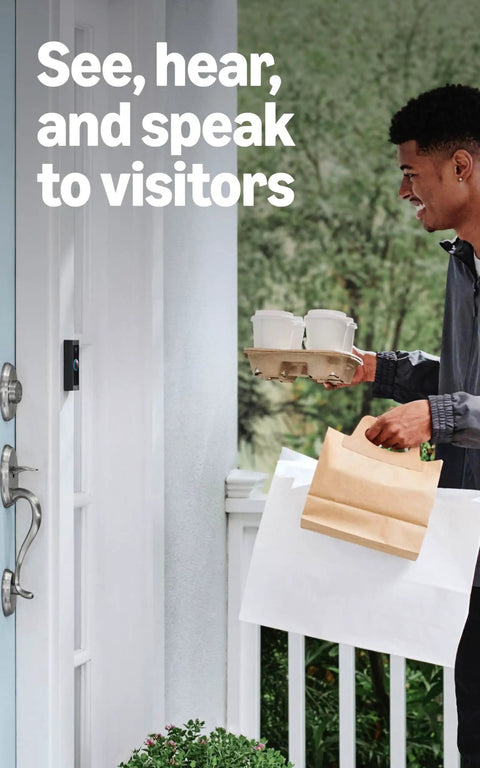 A man using Top Shelf Hardwired Video Doorbell Camera with Flawless 1080p HD Streaming to greet delivery at home.