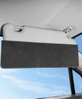 High Density Black Suede Sun Visor Extender For Tesla Cybertruck mounted on dashboard, blocking sun glare.