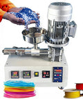 Workhorse Desktop 3D Printer Filament Extruder Maker With Crisp Digital Screen And Hassle Free Pellet Feed System For Churning Out Clean Recycled Plastic Filament At Ridiculous Speeds. Close-up of the extruder with blue pellets.