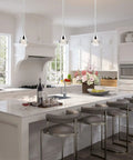 Sleek Bubble Crystal Glass Chrome Pendant Light For Kitchen Island And Dining Room over a modern kitchen island setup.