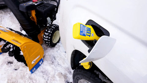 Water Removal and Gas Line Antifreeze for Winter Starts Keeps Your Fuel System Free of Water Prevents Gas Line Freezing and Rust Protection Plus Easy Starts in Cold Weather 12 Fl Oz being poured into vehicle's fuel tank in winter setting