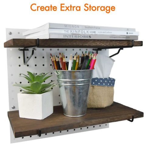 Two Pack Wooden Pegboard Shelves With Pro Grade Brackets And Thick Pegboard Hooks Durable Tool Organizer System holding books, plant, and bucket.