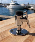 Heavy Duty 316 Stainless Steel Door Stopper Catch Set For Rv Trailer And Boat With Sleek Mirror Finish on wooden table.