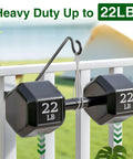 Heavy Duty Deck Hook Railing Bird Feeder Hanger With Rustproof Coating For Flower Baskets And Outdoor Patio Decor Built Like A Tank With Zero Drill Install Holds Twenty Two Pounds No Sweat Setup, featuring weights on a railing.
