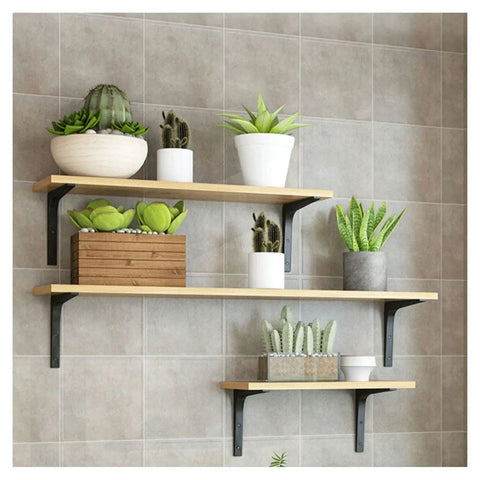 Heavy Duty L Shaped Corner Wall Mount Shelf Brackets With Thickened Steel Build For Floating Industrial Storage That Handle Load Like No Sweat And Bring Major Clean Vibes To Your Space In Black with wooden shelves and potted plants.