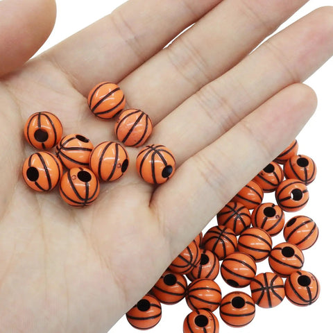 Basketball Beads Set For Crafting, 100 Pcs Lightweight Acrylic Spacer Beads With Big Holes And 4mm Bore in hand