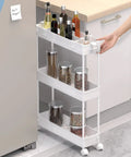 Slim Compact 3 Tier Storage Cart with Rolling Utility Wheels in kitchen, slide out design for tight spaces, white finish, holding jars