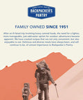 Backpackers in rugged terrain with text about freeze dried dessert product quality and history since 1951