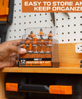 Router Bit Set 1 Quarter Inch Shank 12 Piece Woodworking Bits in a transparent case on a workshop pegboard.
