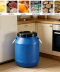 Blue Food Grade Plastic Sealed Storage Barrel With Inner And Outer Double Seal Screw Lid placed in a kitchen setting