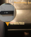 11 Inch Full Extension Drawer Slide With Triple Fold Ball Bearing And Soft Close, mounted under a dresser drawer, illuminated view.