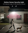 Outdoor Solar Lights With Motion Sensor illuminating path with woman walking dog, showing 120° detection angle and 16-26ft range