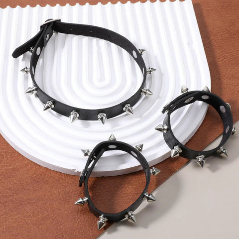 Dope Three Piece Leather Punk Set Featuring Spiked Gothic Choker And Dual Studded Wristbands For Savage Street Style Rock Edge Heavy Metal Fits Perfectly with adjustable black spiked choker and dual wristbands.