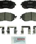 Bosch QuietCast Ceramic brake pad set, front view with four pads and hardware clips
Bosch QuietCast Ceramic brake pads back view showing stamped backing plates
Close-up of friction material on Bosch QuietCast ceramic brake pad
Includes metal clip hardware and grease packet from Bosch