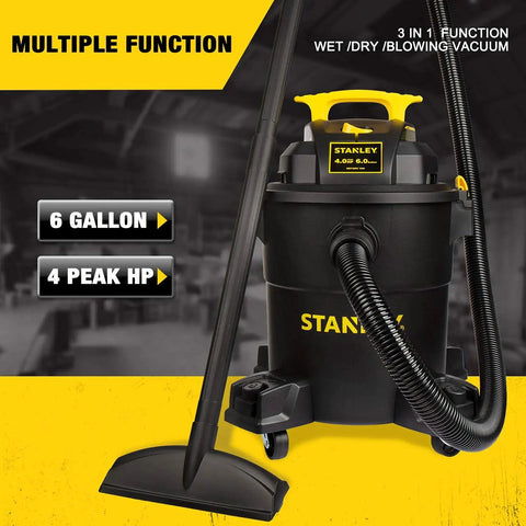 Beast Mode Wet Dry Vacuum With 6 Gallon Tank And 4 HP Power shown with attachments in garage setting