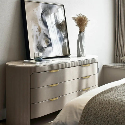 Bedroom dresser with abstract art and vase, featuring Edge Finger Pull For Cabinets And Drawers, Concealed Aluminum Hidden Door Handle in Brushed Brass.