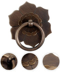 Close-up of Vintage Metal Cabinet Pulls With Lotus Ring Handles Antique Bronze Drawer Knobs for Kitchen and Dresser, front view.