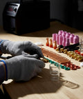 Nishiyuenyi 71 Pc Industrial Tig Consumables Kit With Torch Nozzles Cups Collets Sealing Rings on a workbench with gloves.