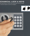 Hand operating digital lock on 40 Key Cabinet With Digital Lock Key Safe For Office And Valet Use, Heavy Duty 16 Gauge Steel Lock Box