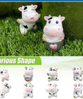 Front view: eight white cow car dashboard ornaments; plastic mini interior decor for cars.