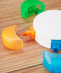 Three Piece Flower Petal Highlighters Set In Five Colors on wooden surface showing orange, blue, and green caps in petal shape