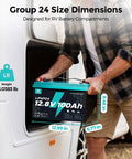 Person placing 12V 100Ah LiFePO4 Deep Cycle Battery Group 31 With 120A BMS in RV compartment, Group 24 dimensions
