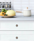 Set Of 4 1.37 Inch Round Cabinet Knobs Brown Butterfly And Flower Design, Glass And ABS Knob Handles on white drawers