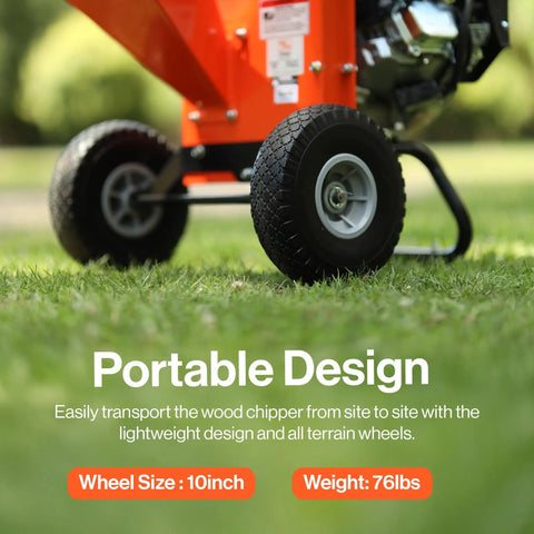 Compact 7HP Mini Wood Chipper Shredder Mulcher For Quick Yard Cleanup Handles Branches Up To 3 Inches, orange chipper on grass