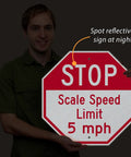 Tough As Nails Custom Stop Sign 18 X 18 Inches With Super Slick 3M Reflective Finish Hella Durable Rustproof Aluminum Metal For Outdoor Parking Lots Gates And Garages Usa Made held by a person.
