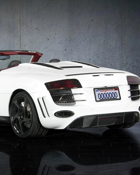 White sports car with Carbon Fiber Pattern License Plate Frames 2 Pack Black Aluminum Front And Rear Car Tag Holder
