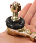 Close-up of handheld M10 tie rod end ball joint from Two Pairs M10 Tie Rod End Ball Joint Kit For Go Karts And ATVs, Heavy Duty Iron Construction, No Tools Needed Bolt-On Install, Ultra Durable Steering Upgrade For Racing Quads And Dirt Bikes
