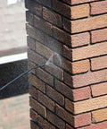 Applying Masonry Chimney Water Repellent Sealer With Siloxane Formula, Breathable And Non Film Forming, Clear Waterproof Coat to a brick chimney.