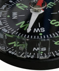 Close-up of Water Resistant Hiking Compass With Lensatic Bearing Guide, showing detailed compass face with lensatic markings.