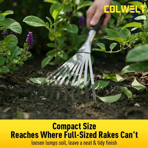 Hand Rake 16.5 Inches For Tight Spots And Flower Beds With 9 Flat Tines in use among plants, includes hanging hole for storage