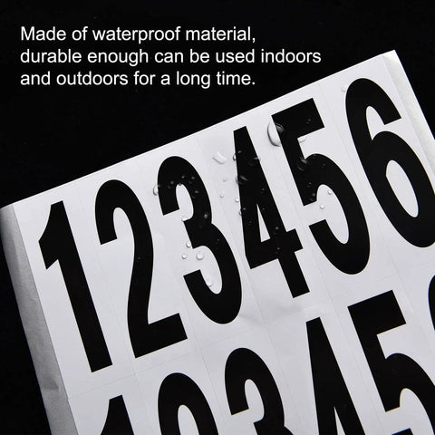 Mailbox Numbers And Letters Stickers For Outdoor Use, Black Vinyl Address Decals, waterproof close-up view with droplets.