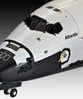 Close-up of Space Shuttle Atlantis 1 To 144 Scale Model Kit With 64 Parts, Multicolor Finish, showing cockpit details and logo.