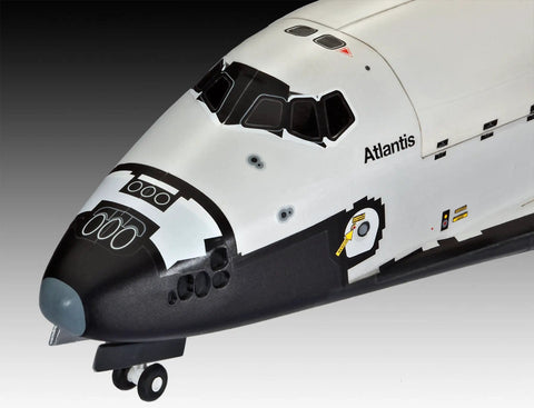 Close-up of Space Shuttle Atlantis 1 To 144 Scale Model Kit With 64 Parts, Multicolor Finish, showing cockpit details and logo.