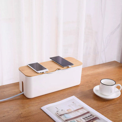 Small White Cable Management Box for Desk and Home Office, Cord Organizer for Power Strips and Surge Protectors on wooden table