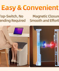 Person using Under Desk Electric Foot Warmer For Office And Home, showing top-switch and magnetic closure for ease of use.