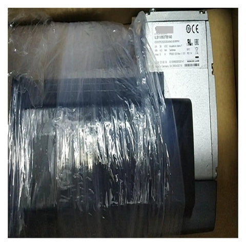 Boss Level Precision Stepper Motor ILS1V853TB1A0 in cardboard box, wrapped in plastic, silver and black industrial unit