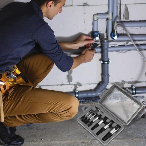 Person using the Eight Piece Water Pipe Screw Extractor Set For Damaged Screws And Bolts Alloy Steel Construction Rustproof And Heat Treated Pro Grade Plumbing Kit With Sizes One Through Eight For Quick DIY Repairs on plumbing pipes, with the extractor set visible in the foreground.