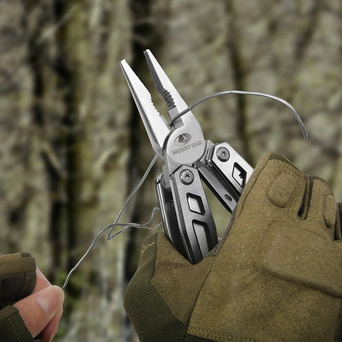Multitool 21 In 1 Stainless Steel Pocket Knife With Screwdriver Sleeve Self Locking Pliers shown cutting wire outdoors