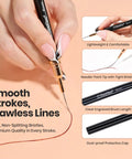 Close-up of hand using Liner Nail Art Brush Set Of 5 With Palette Holder For Long Lines And Fine Details Metallic Nail Pens 5mm 9mm 15mm 20mm 25mm Pro Grade Manicure Tools For Clean Snappy Nail Designs on pale surface.
